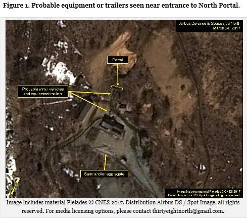 A satellite image showing four or five vehicles or trailers at the entrance to the North Portal of North Korea's Punggye-ri nuclear test site unveiled by 38 North.