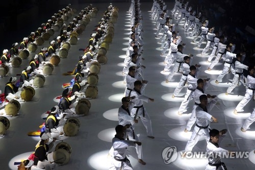 The World Taekwondo Federation (WTF) demonstrators perform during the opening ceremony of the WTF World Taekwondo Championships at T1 Arena in Muju, North Jeolla Province, on June 24, 2017. (Yonhap)
