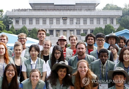 Participants in the Peace Camp for Youth program, organized by the South Korean government in 2016, pose for a photo at the truce village of Panmunjom in this undated file photo. (Yonhap)
