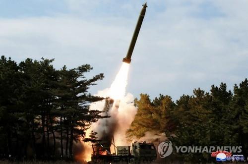 A projectile is launched during a long-range artillery drill by the North Korean army's long-range artillery sub-units on March 2, 2020, in this photo released by the North's official Korean Central News Agency the next day. North Korean leader Kim Jong-un inspected the drill. The report came one day after South Korea said the North fired what appeared to be two ballistic missiles. (For Use Only in the Republic of Korea. No Redistribution) (Yonhap)