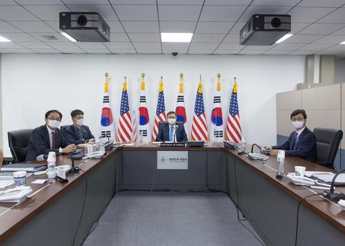 This photo, provided by the defense ministry, shows Deputy Defense Minister Chung Suk-hwan (C) during the biannual 18th Korea-U.S. Integrated Defense Dialogue (KIDD) that the two countries held via videoconferencing on Sept. 9 and Sept. 11, 2020. (PHOTO NOT FOR SALE) (Yonhap)