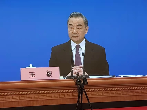 Chinese Foreign Minister Wang Yi speaks during a news conference on the sidelines of the fifth session of the 13th National People's Congress on March 7, 2022, in Beijing (Yonhap)
