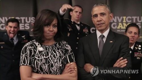 "덤벼봐!" 해리왕자·오바마 부부, 상이군인행사 알리려 '맞짱' - 2
