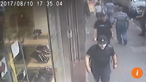 납치당했다고 주장한 시점에 홍콩 거리를 활보하는 하워드 람의 모습을 찍은 CCTV