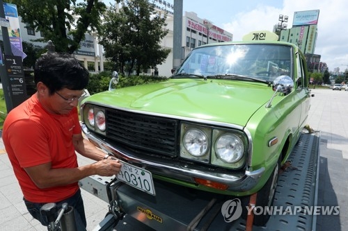 '사복조' 감시 피해 달았던 그 전남번호판
