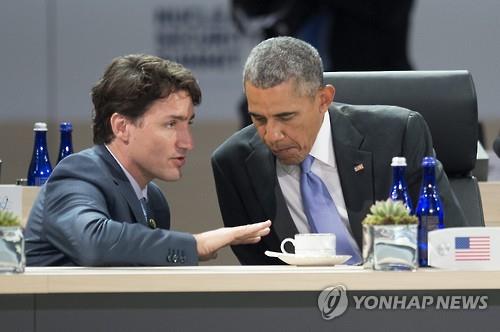 2016년 4월 워싱턴에서 열린 핵안보정상회의에서 만난 버락 오바마 당시 미 대통령(오른쪽)과 쥐스탱 트뤼도 캐나다 총리[EPA=연합뉴스]