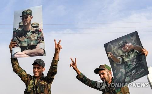 만비즈에 배치된 시리아 정부군 병사들