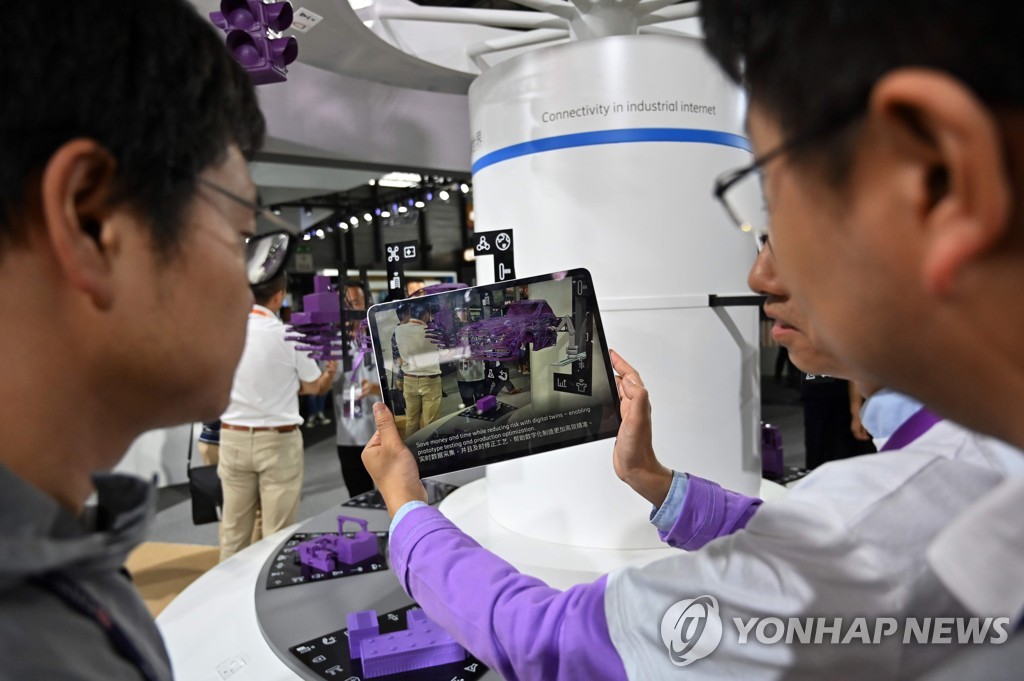 CHINA-TELECOM-MWC