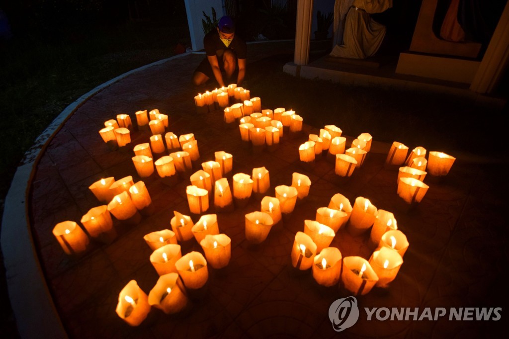 PHILIPPINES-HEALTH-VIRUS-EARTH HOUR