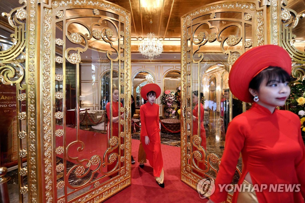 TOPSHOT-VIETNAM-ECONOMY-LUXURY-GOLD-HOTEL