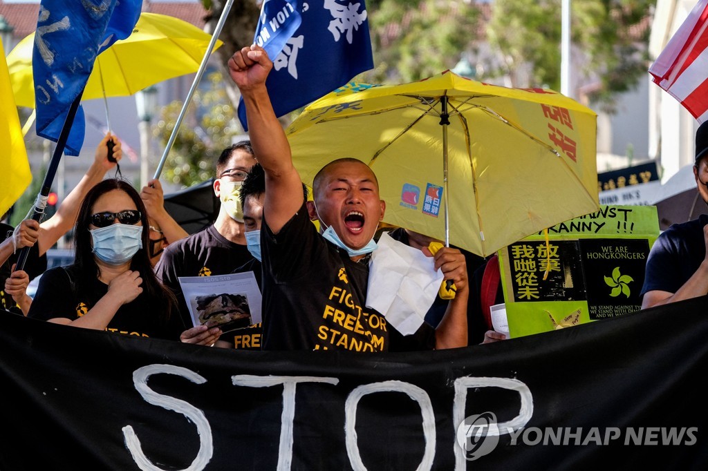 ′홍콩 송환법 반대′…미국서 노란 우산 들고 지지 시위