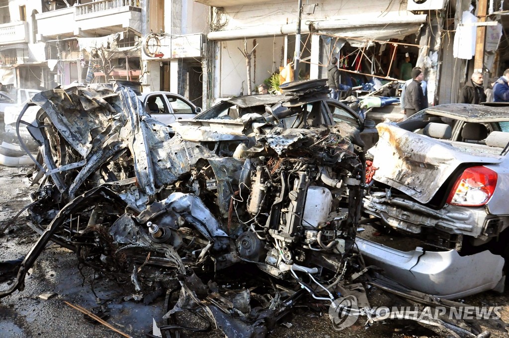 시리아서 지난 26일 일어난 폭탄 테러 현장(EPA=연합뉴스 자료사진)
