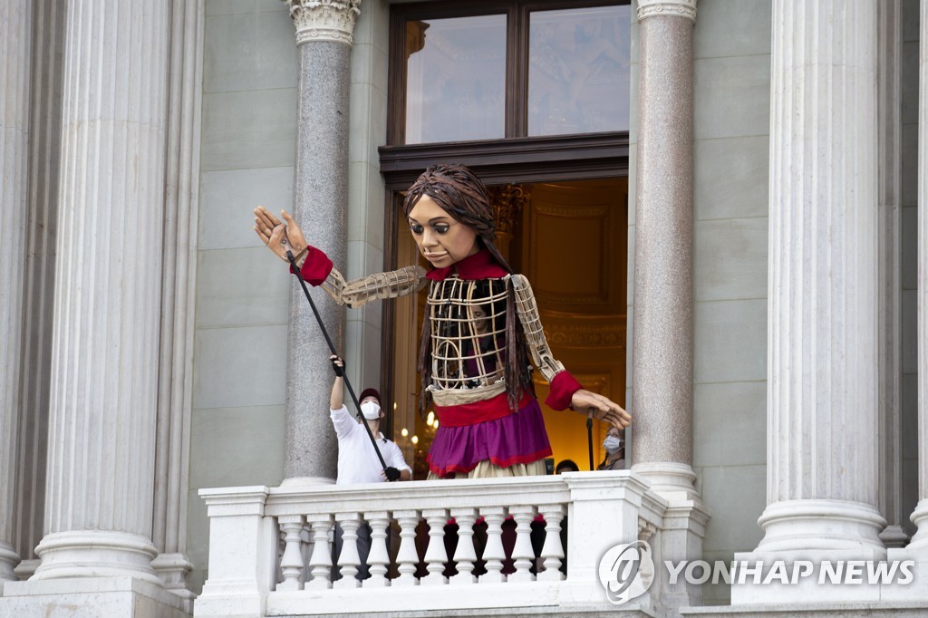 SWITZERLAND GIANT PUPPET AMAL REFUGEES