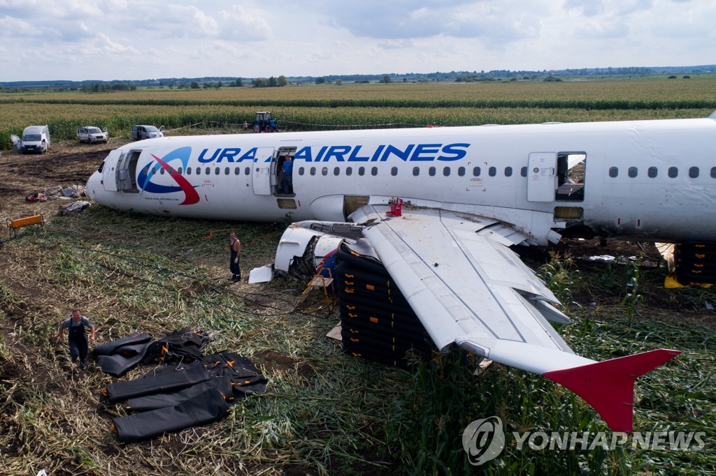 Dismantling Airbus A321 jet at crash landing site near Zhukovsky Airport