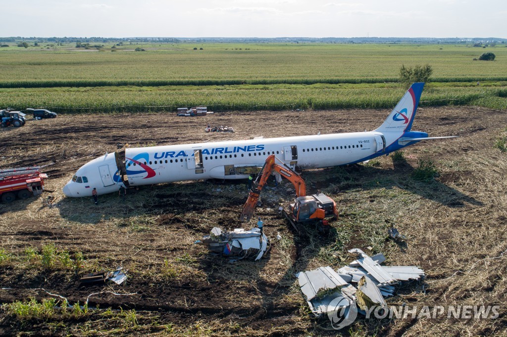 Dismantling Airbus A321 jet at crash landing site near Zhukovsky Airport