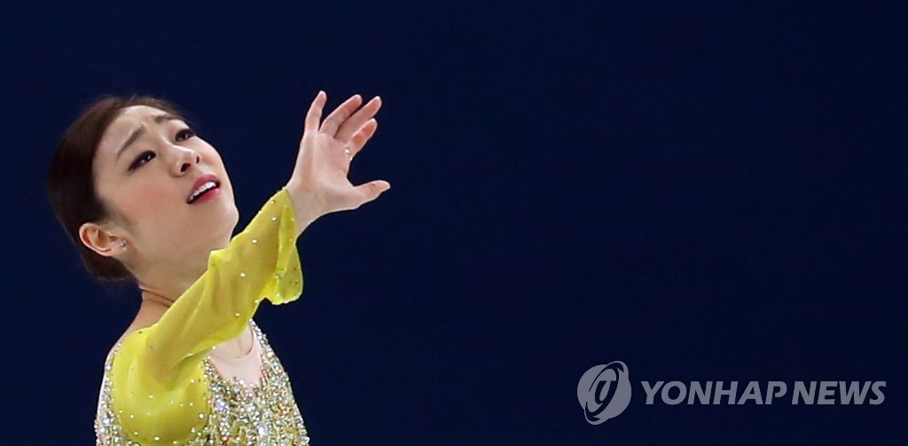 김연아가 20일(한국시간) 소치 동계올림픽 피겨스케이팅 여자 싱글 쇼트프로그램에서 애절한 연기를 펼치고 있다.