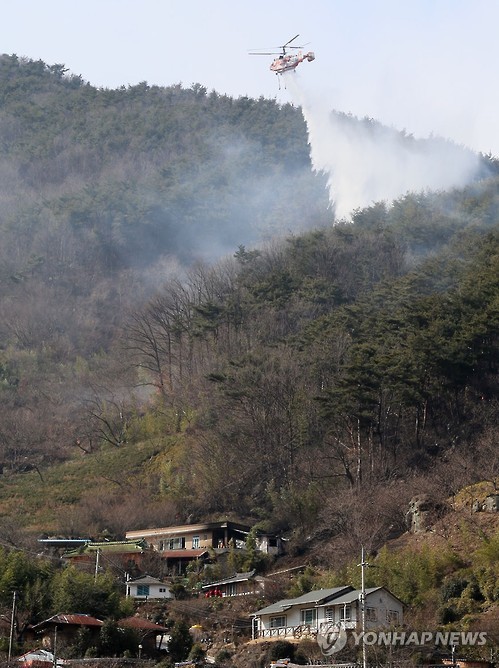 산으로 번진 주택 화재