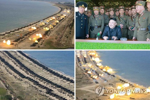 북한 "역대 최대규모 군종합동타격시위…김정은 참관"
