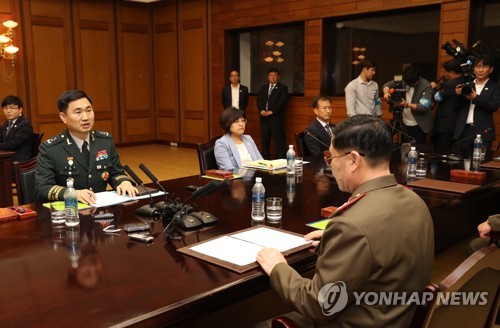 공동보도문 발표하는 김도균 수석대표