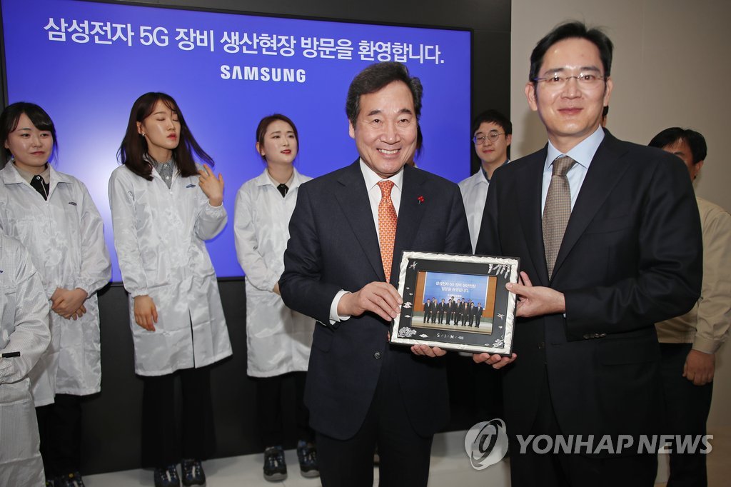 El PM y el heredero de Samsung El PM y el heredero de Samsung