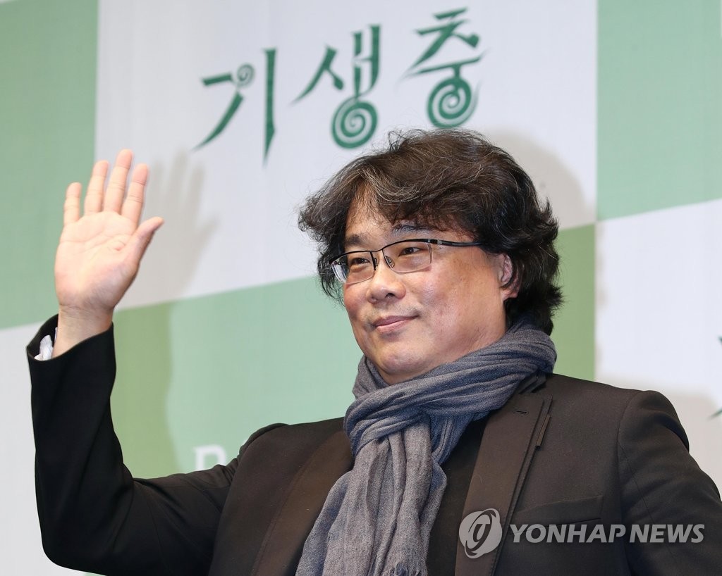 This file photo from Feb. 19, 2020, shows Bong Joon-ho, director of the Oscar-winning Korean film "Parasite," posing for a photo during a press conference at a Seoul hotel. (Yonhap)