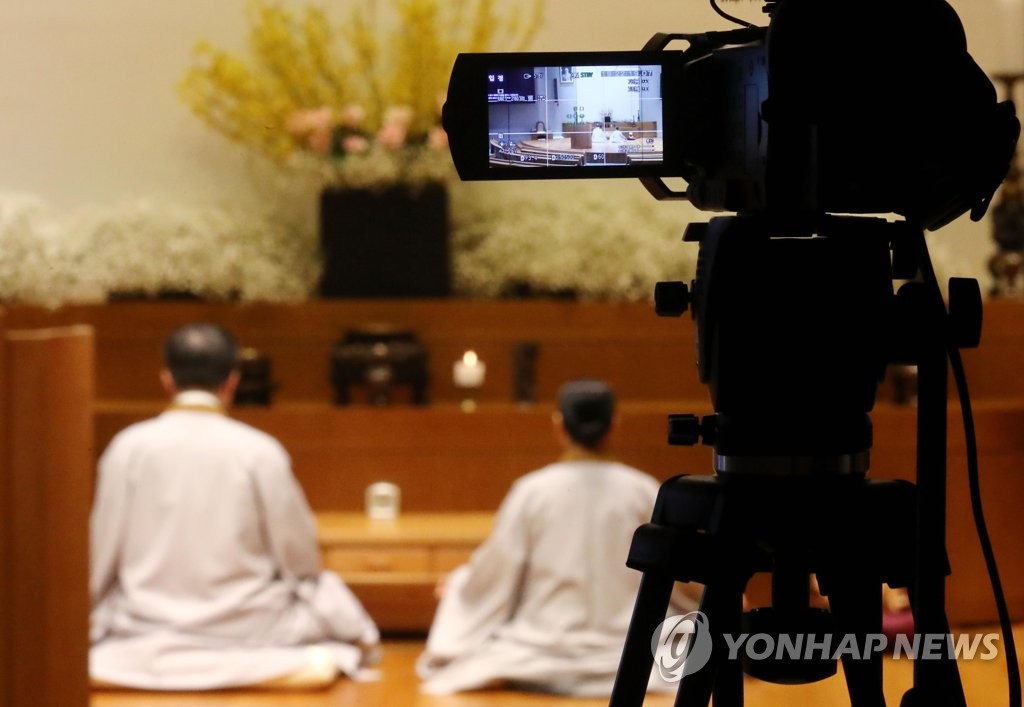 Buddhist service streamed online Buddhist service streamed online