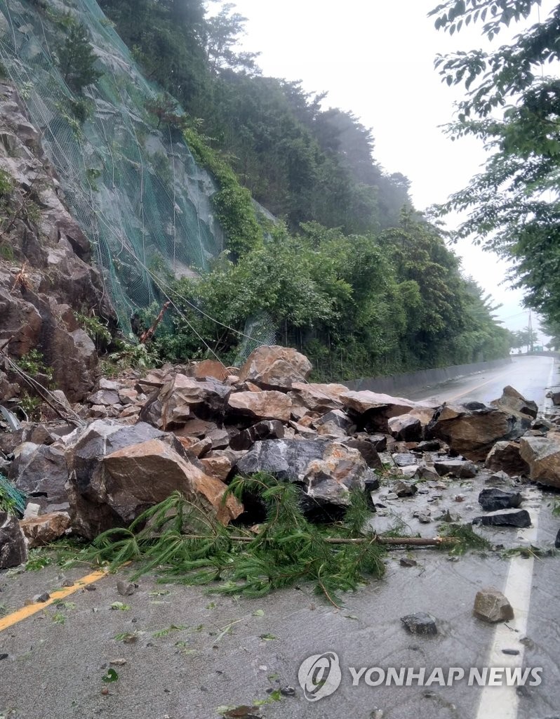Rockslide caused by downpour Rockslide caused by downpour