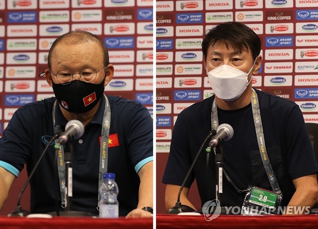 올해 6월 UAE에서 열린 월드컵 2차 예선 맞대결 당시의 박항서(왼쪽), 신태용 감독.