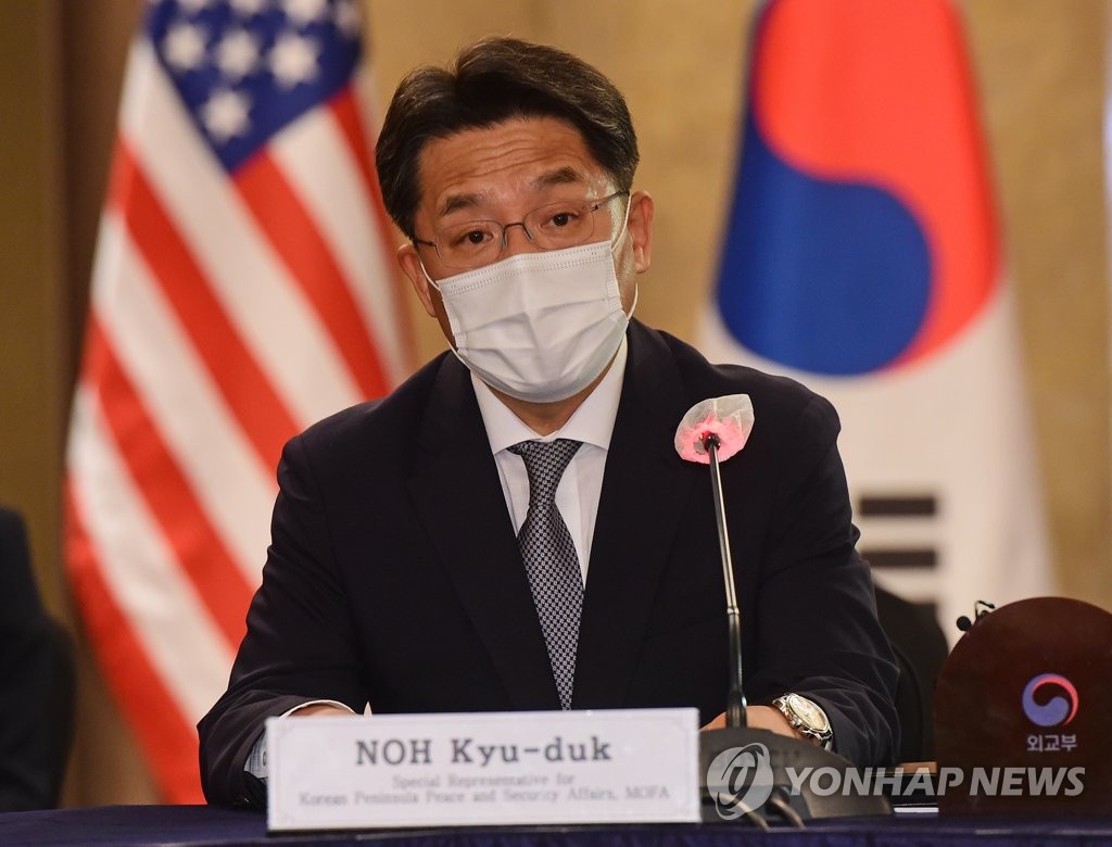 In the June 21, 2021, file photo, South Korea's top nuclear envoy, Noh Kyu-duk, speaks during a trilateral meeting with his U.S. and Japanese counterparts, Sung Kim and Takehiro Funakoshi, respectively, at a hotel in Seoul on June 21, 2021. (Pool photo) (Yonhap)