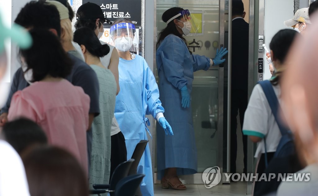 '전쟁터' 같은 코로나19 선별검사소