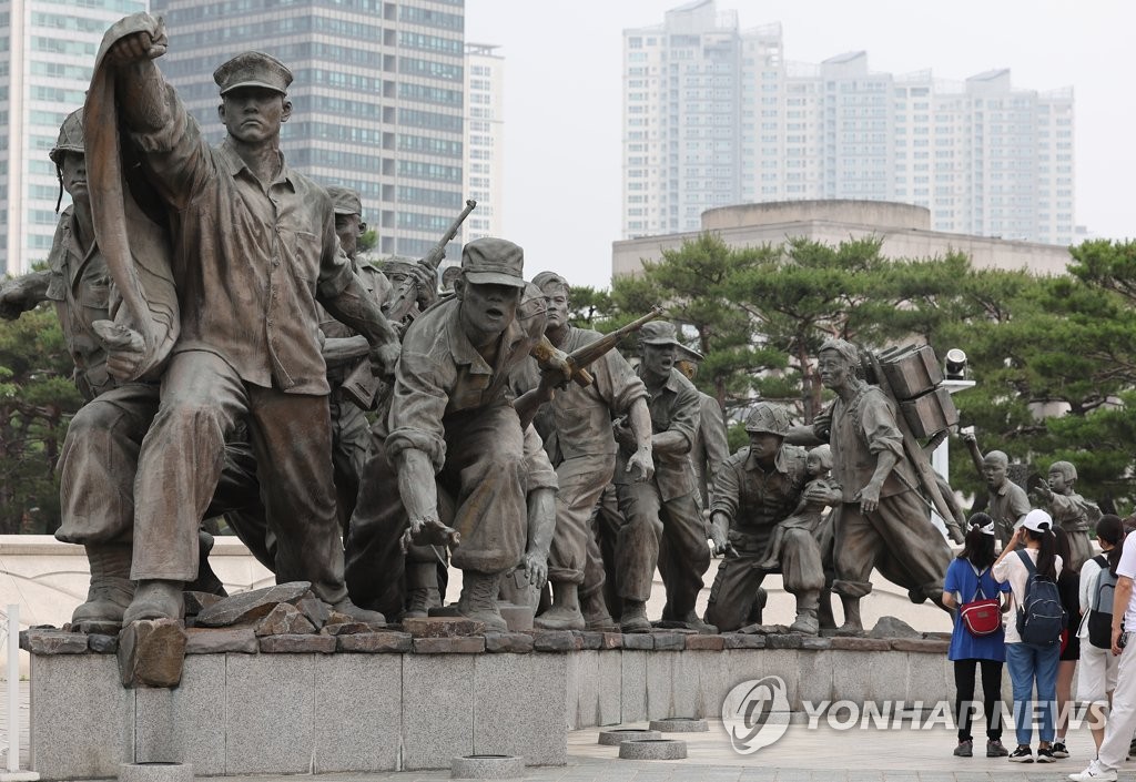 Visitors look at a sculpture at the War Memorial of Korea in Seoul on June 25, 2022, the 72nd anniversary of the outbreak of the Korean War. (Yonhap)
