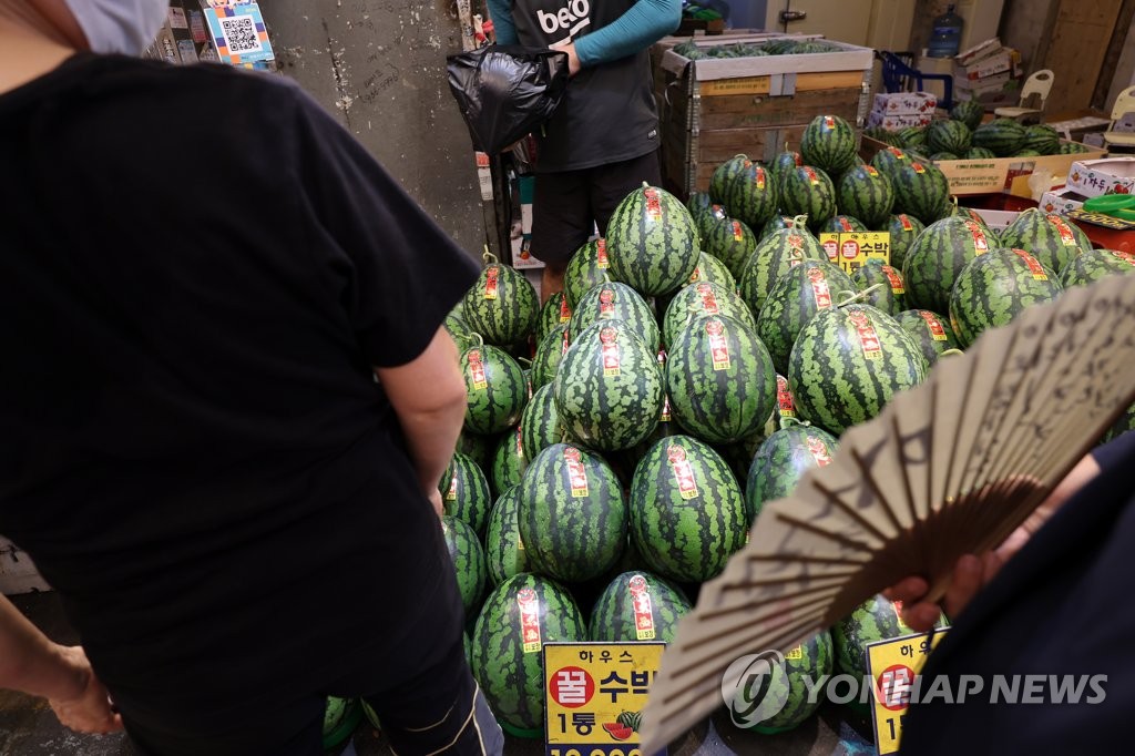 Watermelons in market Watermelons in market