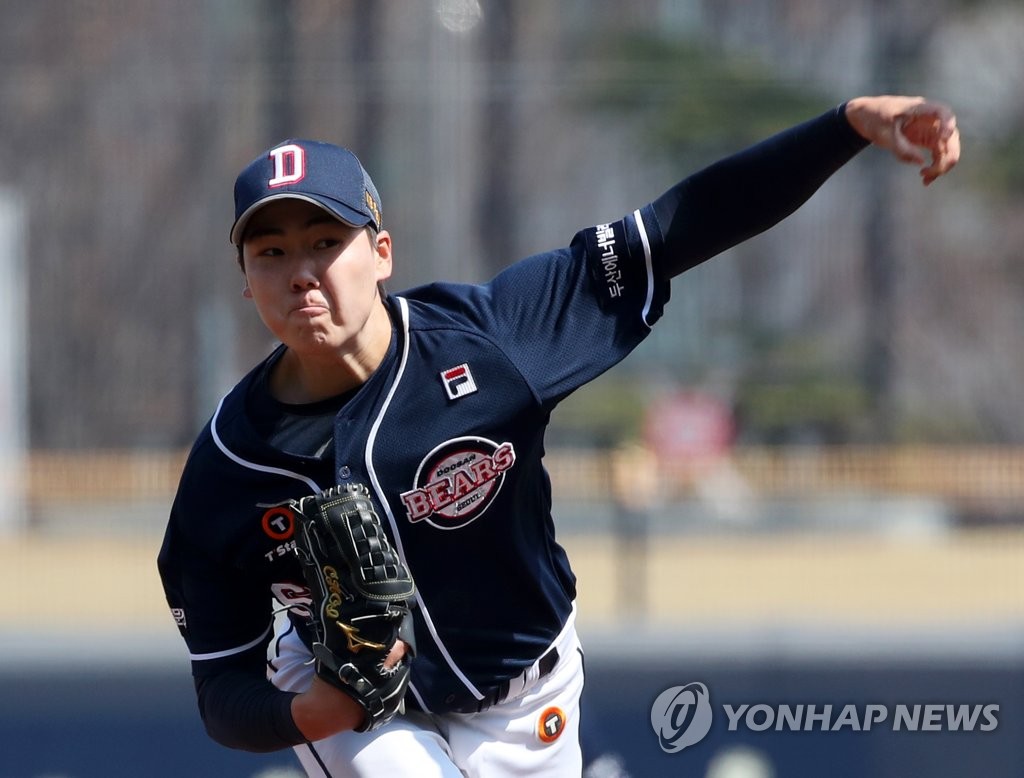 In this file photo from March 19, 2023, Choi Seung-yong of the Doosan Bears pitches against the Kia Tigers during the bottom of the first inning of a Korea Baseball Organization preseason game at Gwangju-Kia Champions Field in Gwangju, some 270 kilometers south of Seoul. (Yonhap)