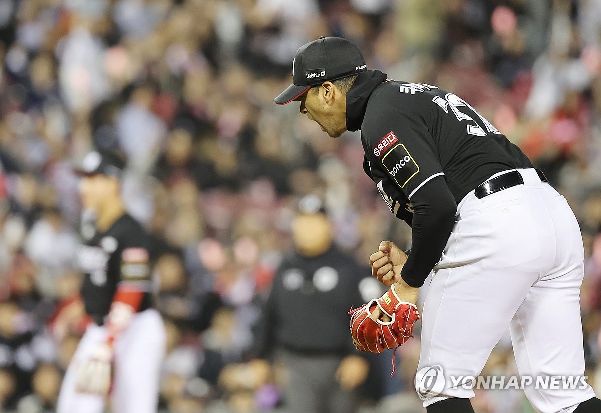 KT Wiz starter William Cuevas celebrates after retiring the side in the bottom of the sixth inning against the Doosan Bears during the teams' Korea Baseball Organization wild card game at Jamsil Baseball Stadium in Seoul on Oct. 2, 2024. (Yonhap)