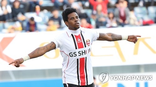 In this file photo taken on Oct. 30, 2016, FC Seoul striker Carlos Adriano celebrates after scoring a goal against Jeju United during a K League Classic match at Seogwipo World Cup Stadium on Jeju Island. (Yonhap)
