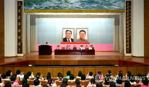 This file photo, dated on April 12, 2016, and released by the Korean Central News Agency, shows members of the North Korea Democratic Women's League holding a meeting in Pyongyang to celebrate the 104th birthday anniversary of the country's late founder and former leader Kim Il-sung. (For Use Only in the Republic of Korea. No Redistribution) (Yonhap)