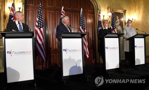 U.S. Secretary of Defense Jim Mattis (L), Secretary of State Rex Tillerson, Australian Foreign Minister Julie Bishop, and Australian Defense Minister Marise Payne hold a joint news conference in Sydney on June 5. (AFP-Yonhap)