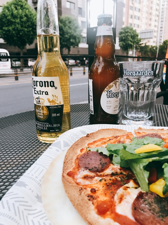 Beer and pizza are served at Cafe 468, located in a quiet residential area in Euijeongbu, just north of Seoul. (Yonhap)