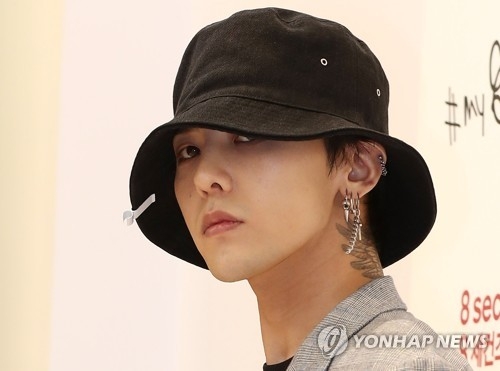 South Korean singer-rapper G-Dragon poses for a photo during a publicity event in Seoul on May 1, 2017, to promote the apparel brand 8seconds. (Yonhap) 