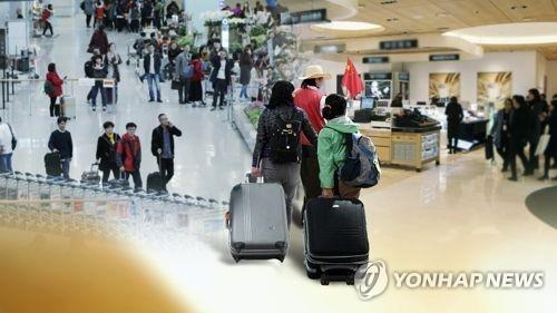 Number of Chinese tourists to S. Korea to halve this year over missile row: BOK - 1