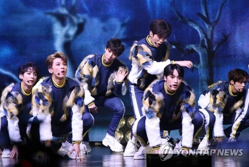 Boy band TRCNG performs on stage during a media showcase for its new single album "Who Am I" at Yes 24 Live Hall in eastern Seoul on Jan. 2, 2018. (Yonhap)
