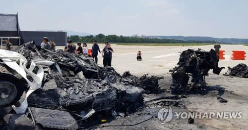 This photo, provided by the family of a victim, shows the wreckage of a marine chopper at a military airport in the southeastern city of Pohang. (Yonhap)