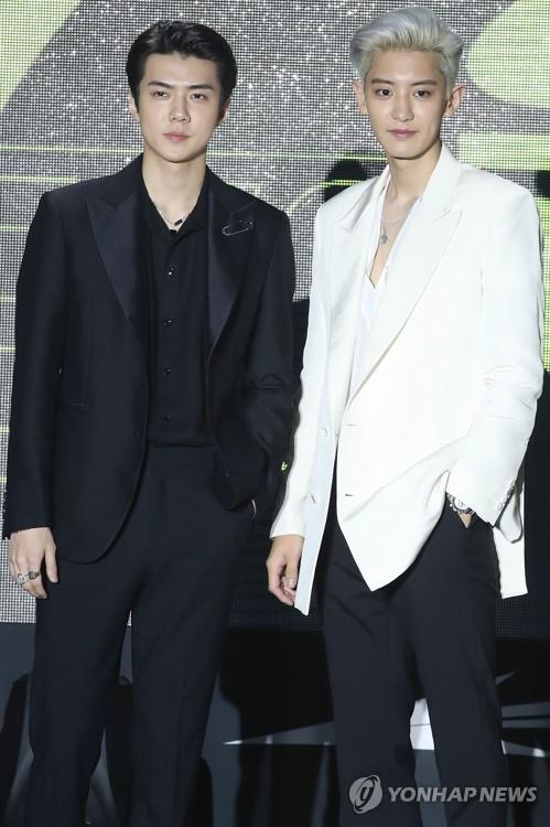 Sehun (L) and Chanyeol pose for photos during a press showcase for their EP, "What a Life," released on July 22, 2019, as the two members of EXO-SC, a subunit of nine-member boy band EXO. (Yonhap)