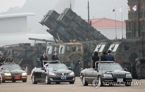 President Moon Jae-in salutes during a review of Patriot Advanced Capability-3 (PAC-3) missiles at a ceremony to mark the 71st Armed Forces Day at an Air Force base in Daegu, 300 kilometers southeast of Seoul, on Oct. 1, 2019. (Yonhap)
