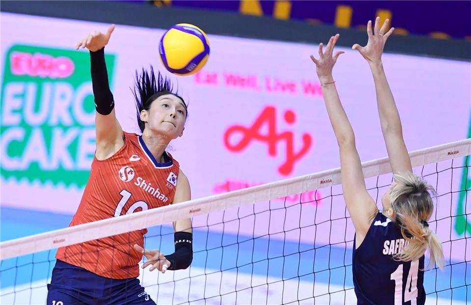 In this photo provided by FIVB on Jan. 9, 2020, Kim Yeon-koung of South Korea (L) hits a spike against Alessya Safronova of Kazakhstan in their Pool B match of the Asian Olympic women's volleyball qualification tournament at Korat Chatchai Hall in Nakhon Ratchasima, Thailand. (PHOTO NOT FOR SALE) (Yonhap)
