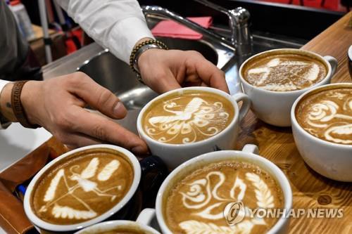 This undated photo shows cups of coffee. (Yonhap)