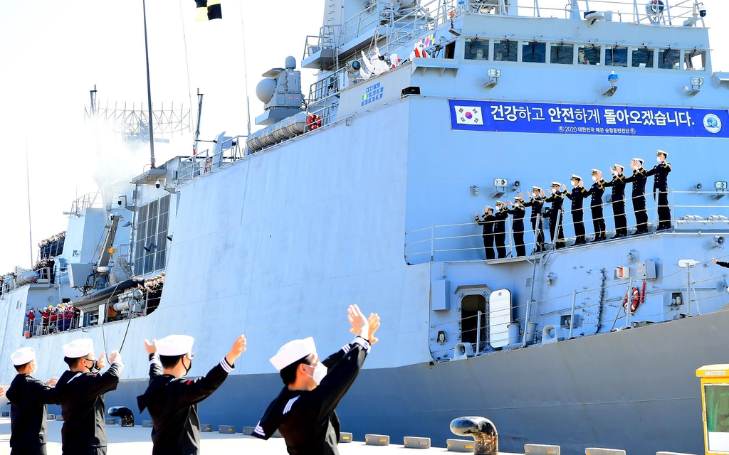 Sailors wave as they depart from the southern island of Jeju on Oct. 14, 2020, for this year's cruise training, in this photo provided by the Navy. (PHOTO NOT FOR SALE) (Yonhap)