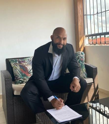 Zoilo Almonte signs his contract with the KT Wiz of the Korea Baseball Organization, in this photo provided by the Wiz on Dec. 23, 2020. (PHOTO NOT FOR SALE) (Yonhap)