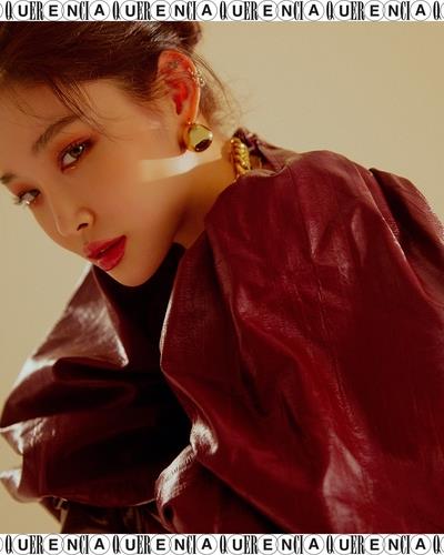 This image, provided by MNH Entertainment, shows a photo teaser for Chungha's upcoming debut full album "Querencia." (PHOTO NOT FOR SALE) (Yonhap)