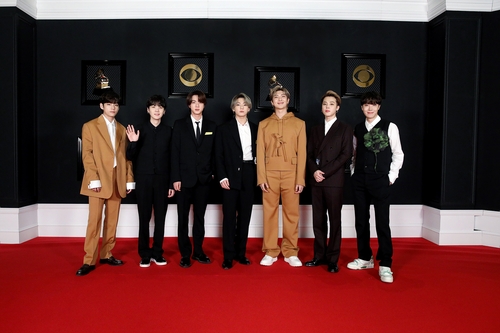 This photo, provided by Big Hit Entertainment, shows BTS taking part in a virtual red carpet event for the 63rd Grammy Awards held in Los Angeles on March 14, 2021 (U.S. time). (PHOTO NOT FOR SALE) (Yonhap) 
